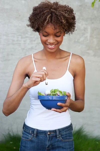 Stock image Pretty African American woman with salad