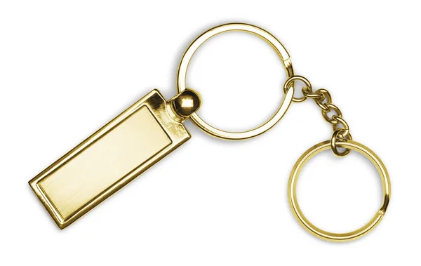 Golden Schlüsselbund auf weißem Hintergrund — Stockfoto