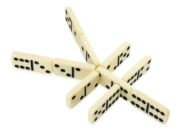 Dominoes in shape of yen currency symbol — Stock Photo, Image