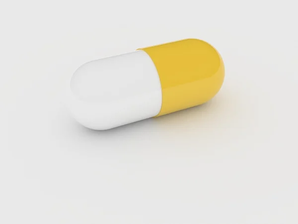 Píldora sobre fondo blanco — Foto de Stock