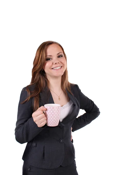 Ділова жінка, молода дівчина, має гальма, тримає чашку на вершині . — стокове фото