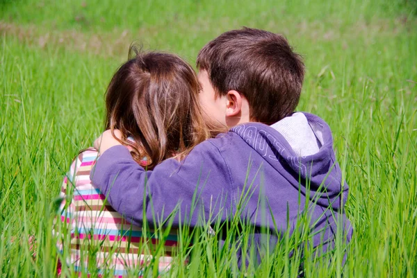 stock image The kiss of a brother to her sister