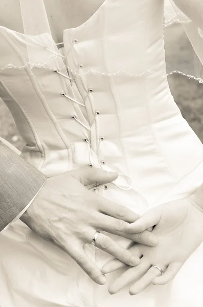 Hands of newlywed couple — Stock Photo, Image
