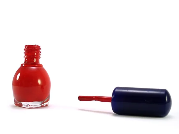 Бутылка лака для ногтей с кисточкой — стоковое фото