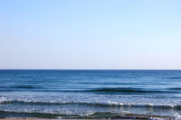 Хвилі на пляжі Стокове Зображення