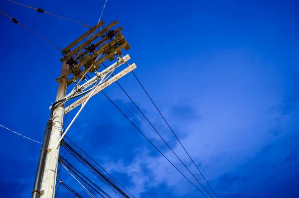 Stock image Electricity post in blue sky