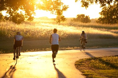 Exercise at Sunset clipart