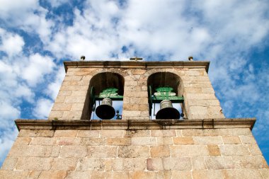 A medieval church bell tower clipart