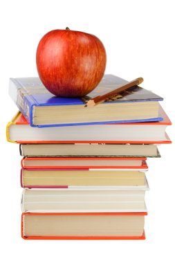 Okul kitapları ve elma