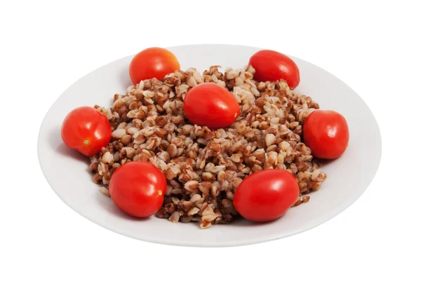 Boekweit granen met tomaten — Stockfoto