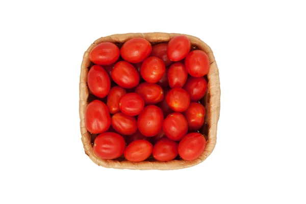 Červená rajčata v košíku — Stock fotografie