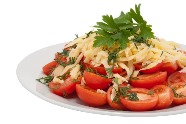 Yukarıdaki kırmızı domates peynir tarafından strewed — Stok fotoğraf