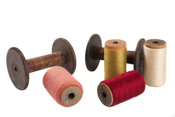 Bobbins and colored threads — Stock Photo, Image
