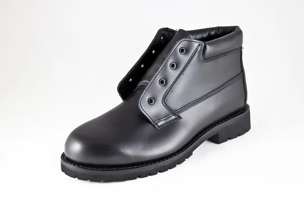 Black boot made ​​of leather — Stock Photo, Image