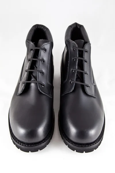 Black boots made ​​of leather — Stock Photo, Image