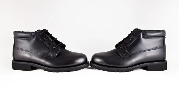 Botas negras hechas de cuero — Foto de Stock