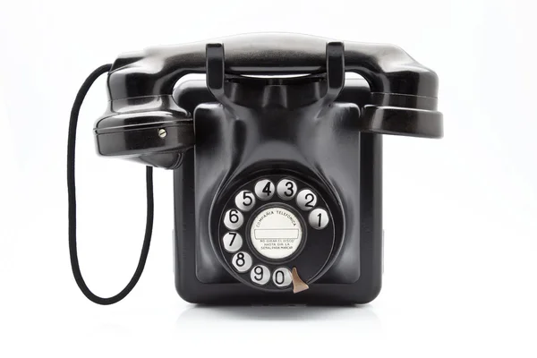 Vecchio telefono nero con disco di selezione — Foto Stock