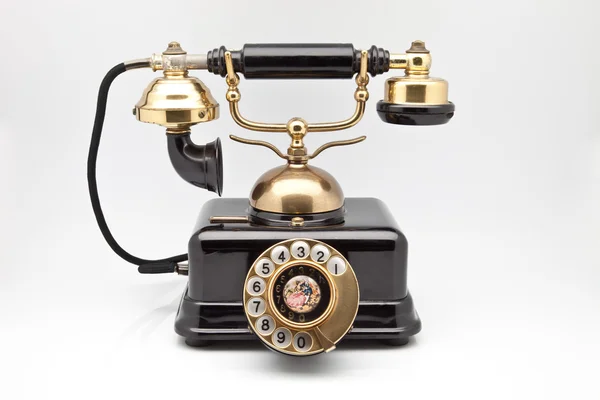 Telefon eleganta gamla guld och svart — Stockfoto