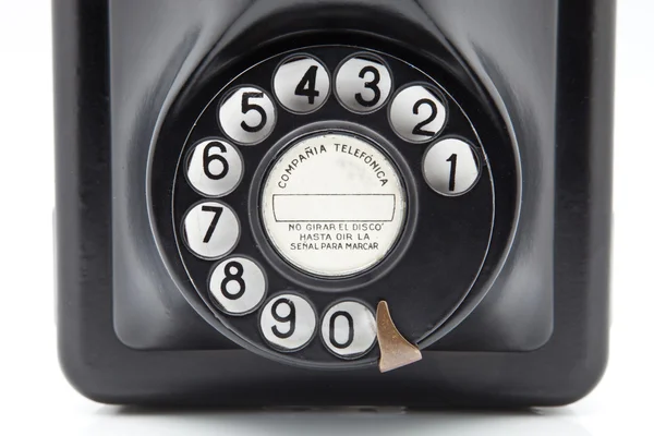 Teléfono negro antiguo con disco de marcación — Foto de Stock