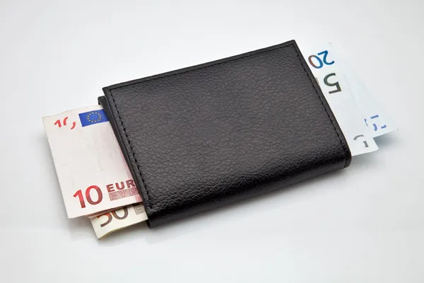 Černá kožená peněženka s hotovostí z — Stock fotografie