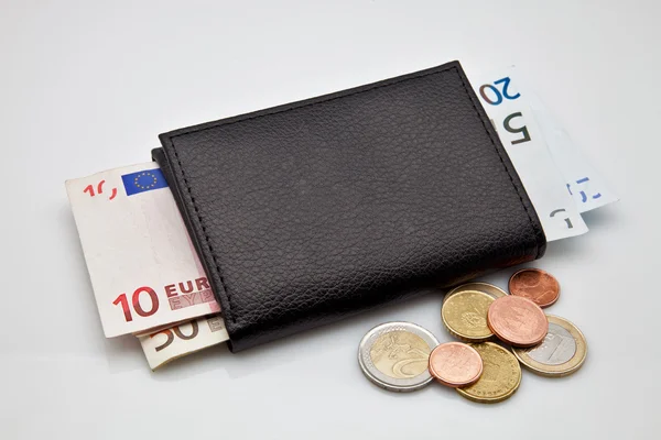 Schwarze Ledertasche mit Bargeld — Stockfoto