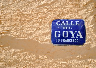 Street sign of Goya in facade clipart