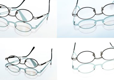 Reading glasses, spectacles and its reflection against light background clipart