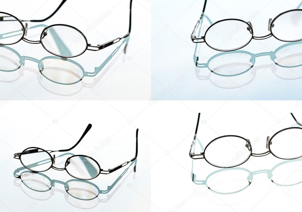 Reading glasses, spectacles and its reflection against light background