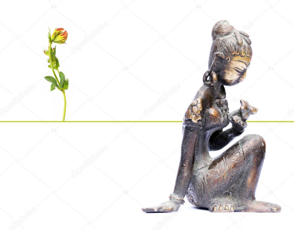 Image with indian sculpture and floral elements