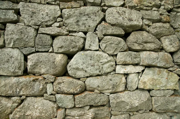 Antico muro di pietra — Foto Stock