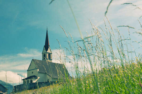 Picturesque old church in alpine landscape