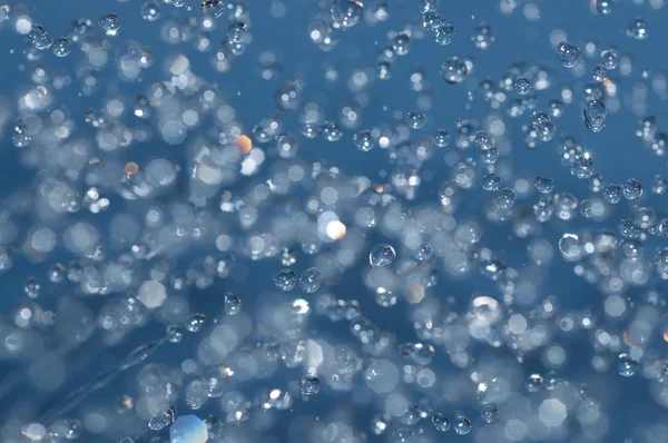 鮮やかな水抽象的 (フィールドの浅い深さ) — ストック写真