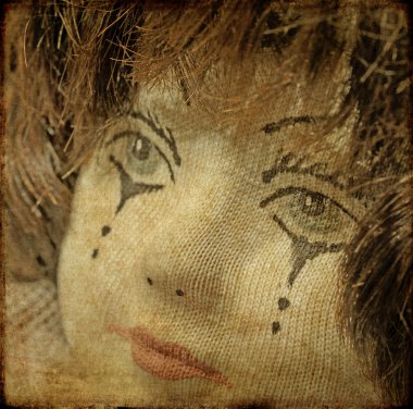 Earthy background image of doll up close clipart