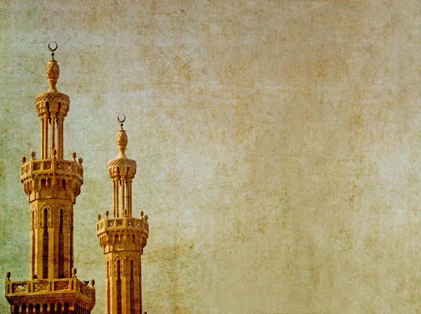 Aardse achtergrond afbeelding islamitische minaretten — Stockfoto