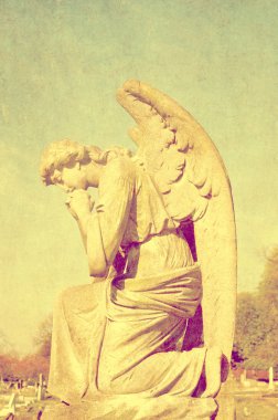 Beautiful statue in english cemetery clipart