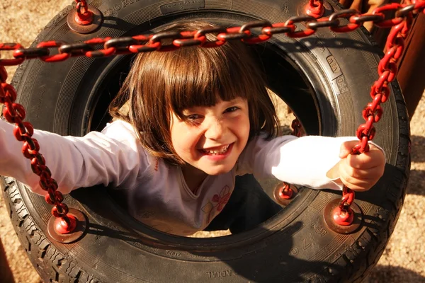 The girl on the playground — Stock Photo, Image