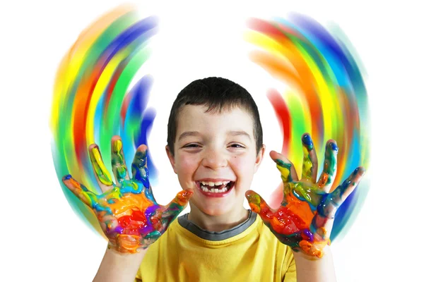 Boy paints color circles by hands — Stock Photo, Image