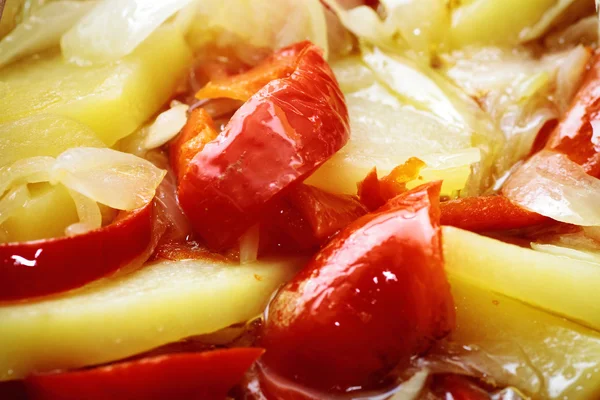 Stock image Mixed vegetables fried in olive oil onion pepper potato contains red