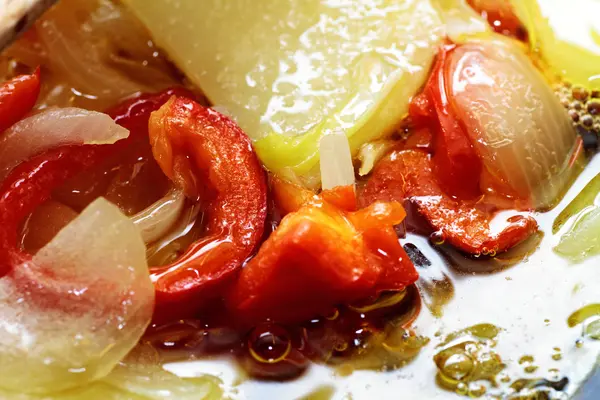 stock image Mixed vegetables fried in olive oil onion pepper potato contains red