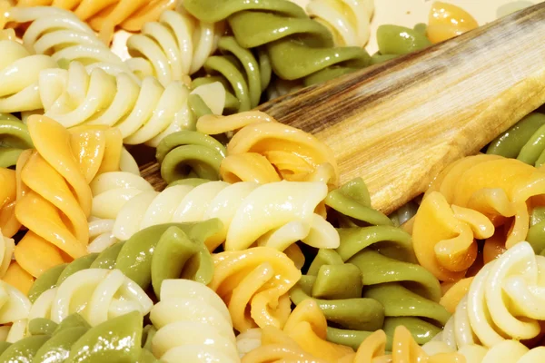 Spiral pasta in boiling hot water Stock Picture