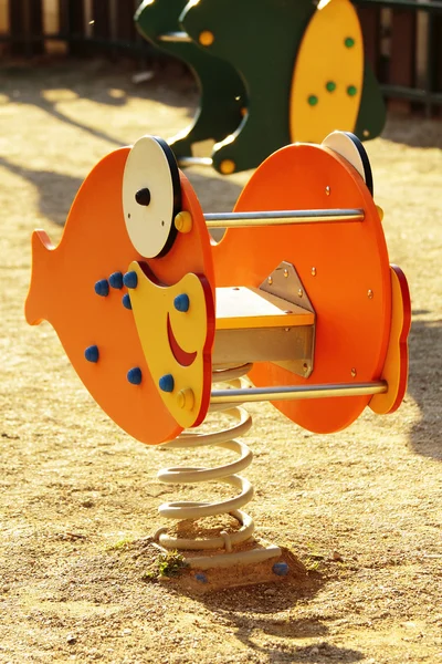 Scène van kinderen speeltoestellen — Stockfoto