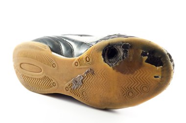 Worn out Sports Shoe with hole clipart