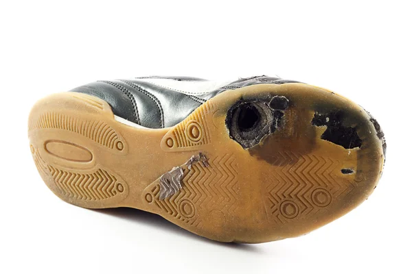 Spor ayakkabı ile delik yıpranmış Stok Fotoğraf