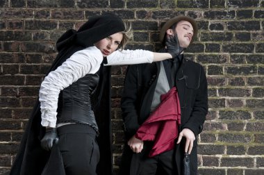 VIctorian woman strangling man clipart