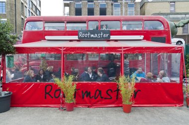 Restaurant in Bricklane market. London, October 17, 2010 clipart