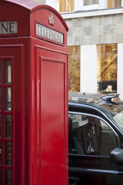 Detalj av röda phonebooth i london, Storbritannien. — Stockfoto