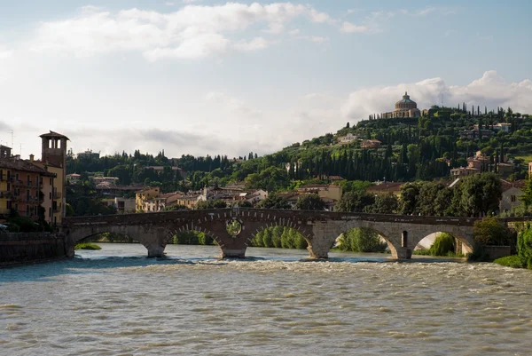 Adige river and stone bridge — Stock Photo, Image