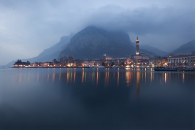 Beautiful view of Lecco in Como Lake Italy at dusk clipart