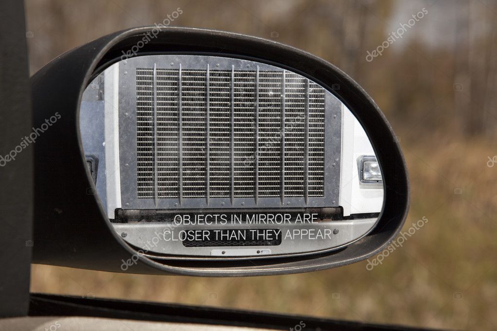 Objects in Mirror are closer than they Appear — Stock Photo © digitex