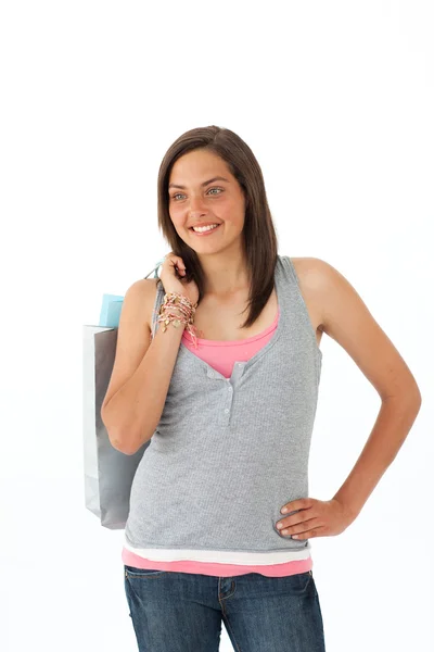 Uśmiechnięta dziewczyna z torby na zakupy — Zdjęcie stockowe